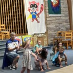 Children singing and dancing in the Peace Tohickon Lutheran Church sanctuary during Hero Central Vacation Bible School