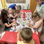 Children decorating hero cookies during Hero Central Vacation Bible School at Peace Tohickon Lutheran Church